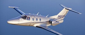Jet privé Eclipse 500 blanc en vol