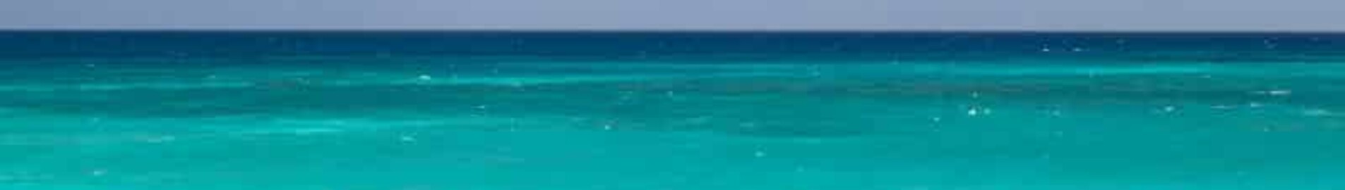 **Alternative Balise :**
location jet privé - Kiteboarding dans eaux turquoise.