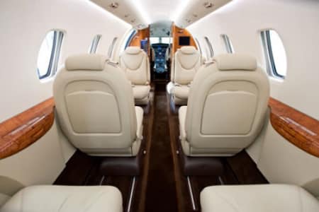 location jet privé - Intérieur CITATION XLS, sièges crème, bois