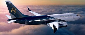 Location de jet privé : BBJ au coucher du soleil.