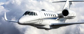 Citation X blanc en vol