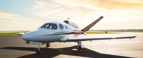 location de jet privé Vision Jet au coucher du soleil