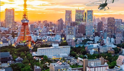 Vue aérienne AEROAFFAIRES Volocopter, coucher du soleil urbain.