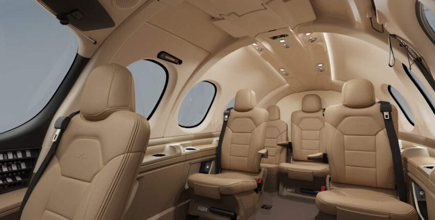 location jet privé Intérieur luxueux du VISION JET SF50, sièges en cuir beige