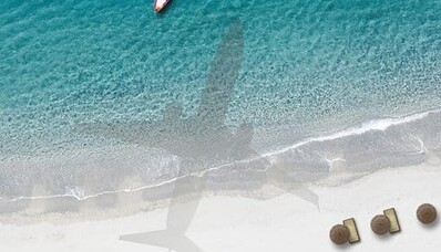 **Texte alternatif suggéré :**

L’aviation durable : location de jet privé et plage.
