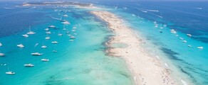 Formentera aerial view of turquoise water and yachts anchored